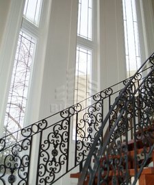 Casement fixed window next to a staircase