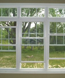 Double hung tilt windows