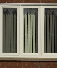 Slim fixed window in a brick home